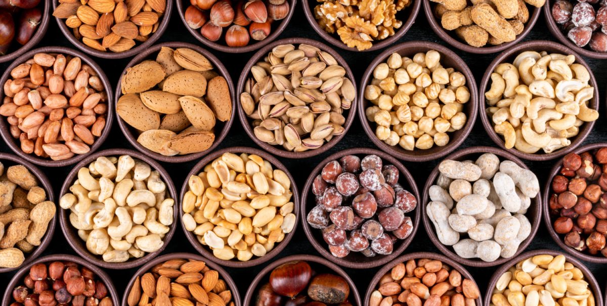 set-pecan-pistachios-almond-peanut-cashew-pine-nuts-lined-up-assorted-nuts-dried-fruits-mini-different-bowls